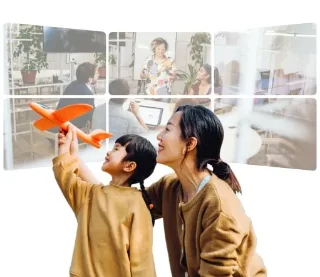A woman and a child gaze up, sharing a moment of wonder and excitement together