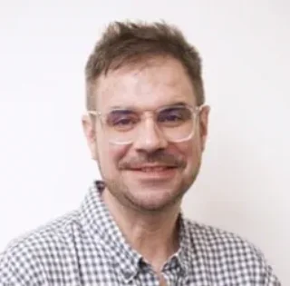 A head shot of Mark Cox.