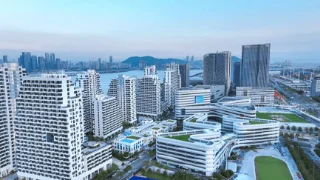 This image shows Tencent's future headquarters, officially named the Shenzhen Internet + Future Tech City, located in the Dachan Bay area of Shenzhen.