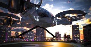 Urban air taxi drone over city skyline at sunset.