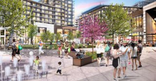 Vibrant mixed-use plaza with shops, green space, and public seating.